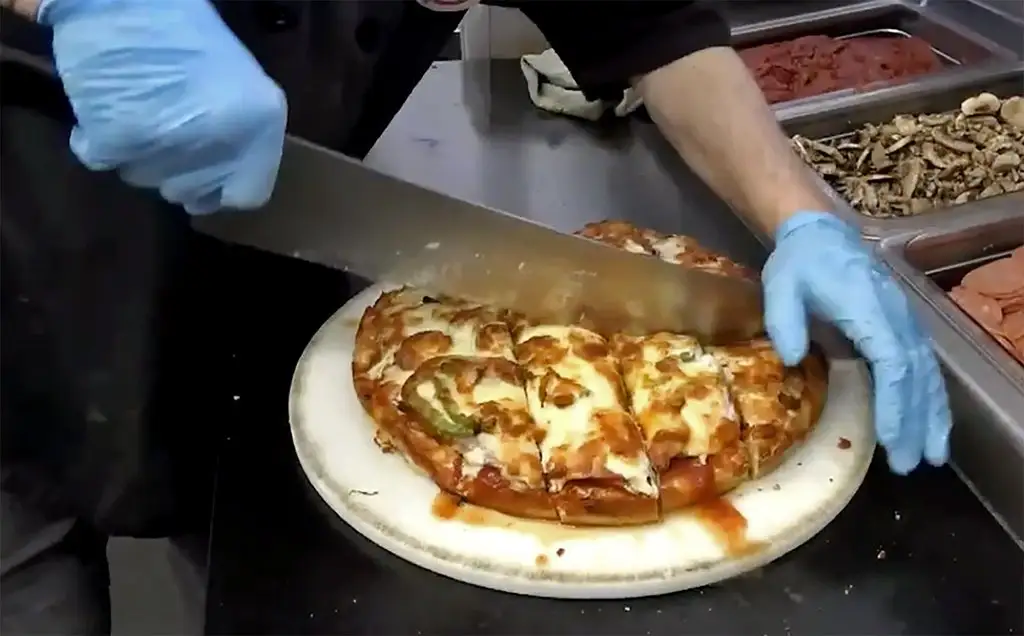 What is Regina pizza? It’s Greek, good and gets under the crust of Rider rivals