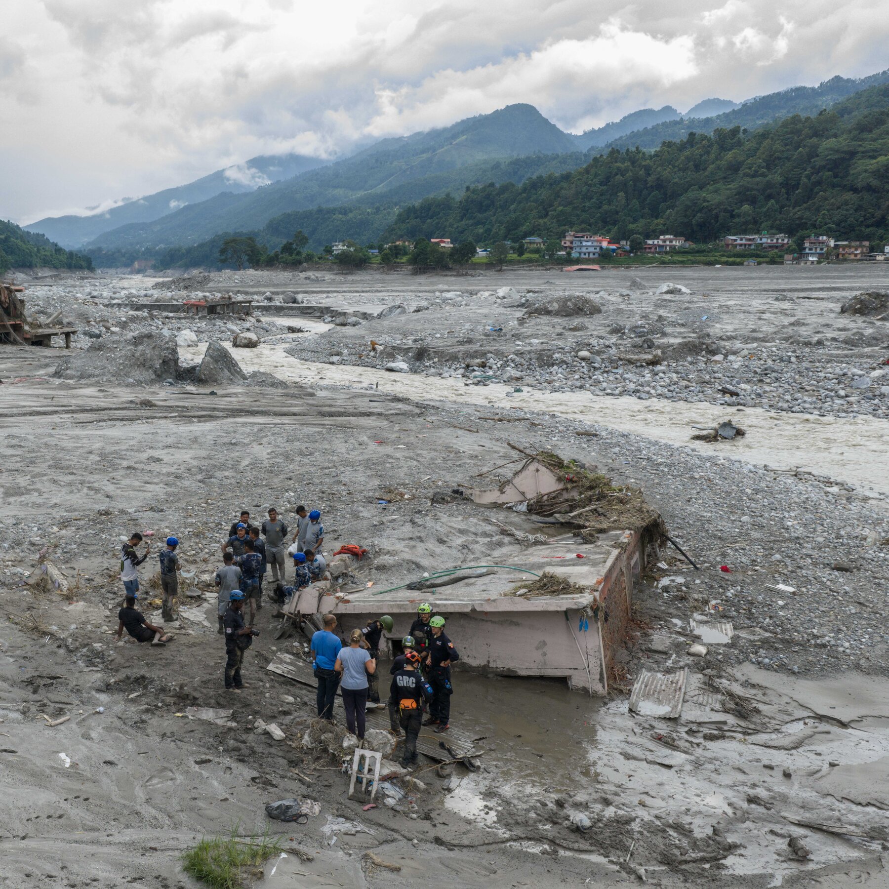 Nepal Floods Buried a House. The Woman Inside Was Still Alive.